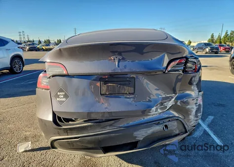 2023 Tesla Model Y from USA, damaged, VIN 7SAYGDEE9PF897277